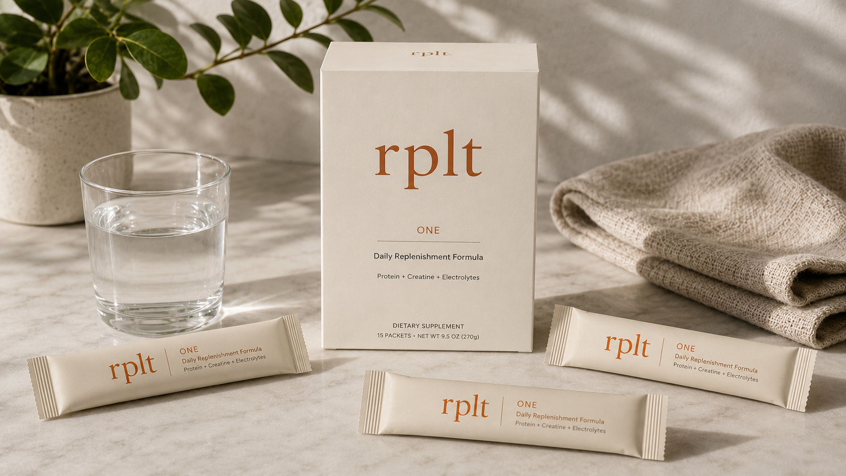 RPLT ONE product box and daily packets on a marble countertop